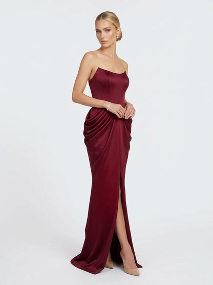 Artful, figure-hugging ruching and draping e429