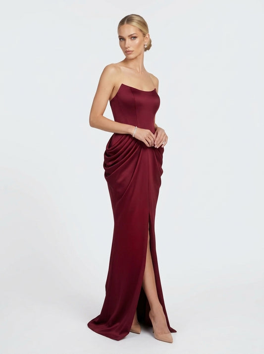 Artful, figure-hugging ruching and draping e429
