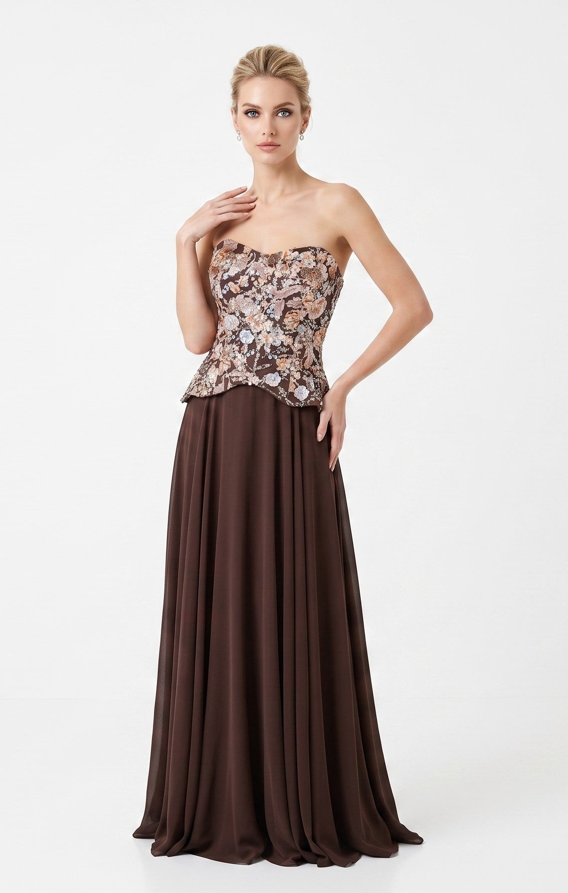 Trägerloses Abendkleid mit floralem Schößchen-Oberteil in Zartrosa Beschreibung: e409
