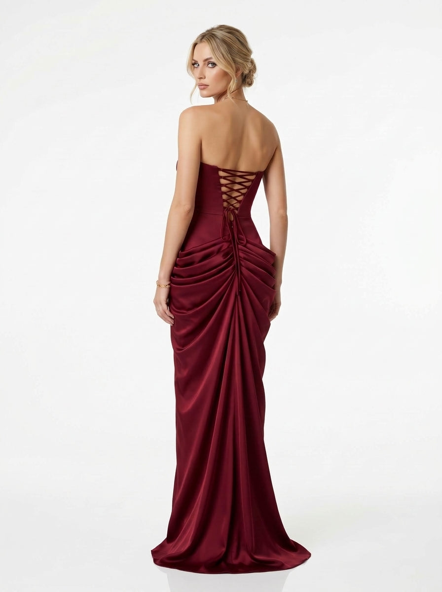 Artful, figure-hugging ruching and draping e429