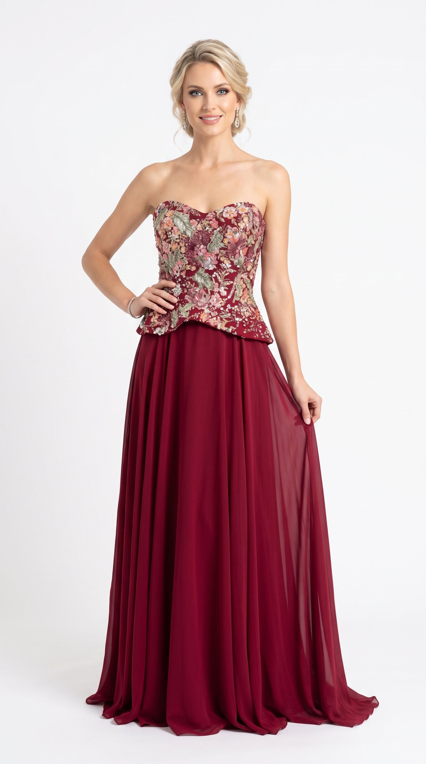 Trägerloses Abendkleid mit floralem Schößchen-Oberteil in Zartrosa Beschreibung: e409