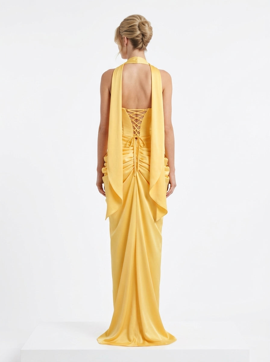 Artful, figure-hugging ruching and draping e429