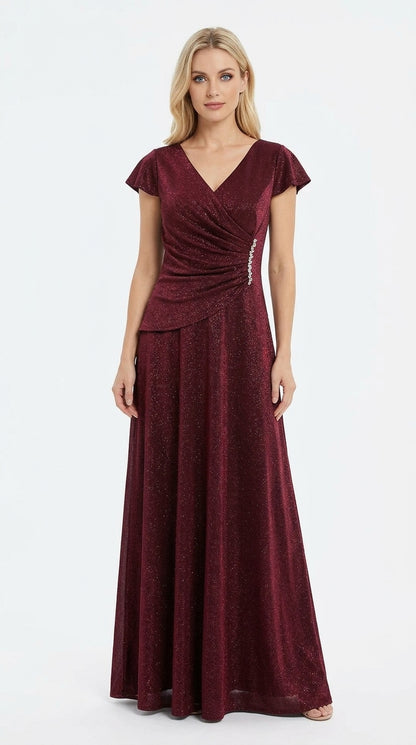 Elegantes, funkelndes Abendkleid in Schwarz mit V-Ausschnitt und Schmuckbrosche e424